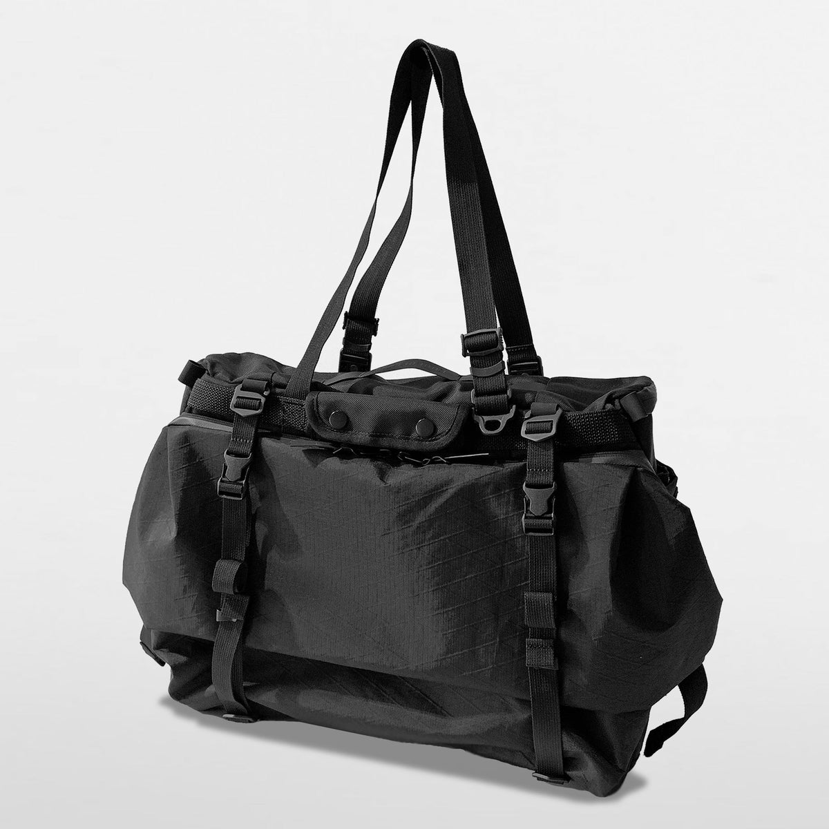 X-Tote™ - 3-Way Messenger Bag